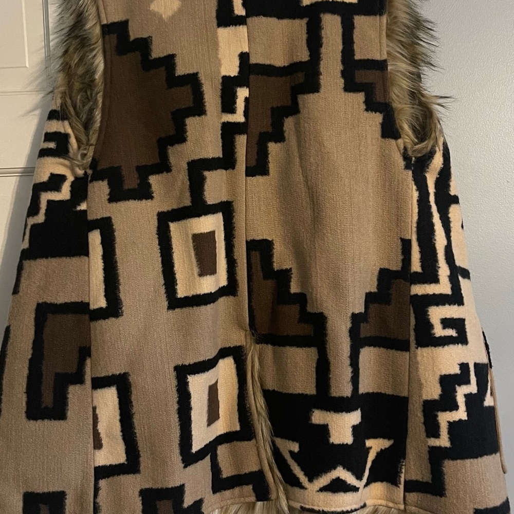 Long faux fur lined vest